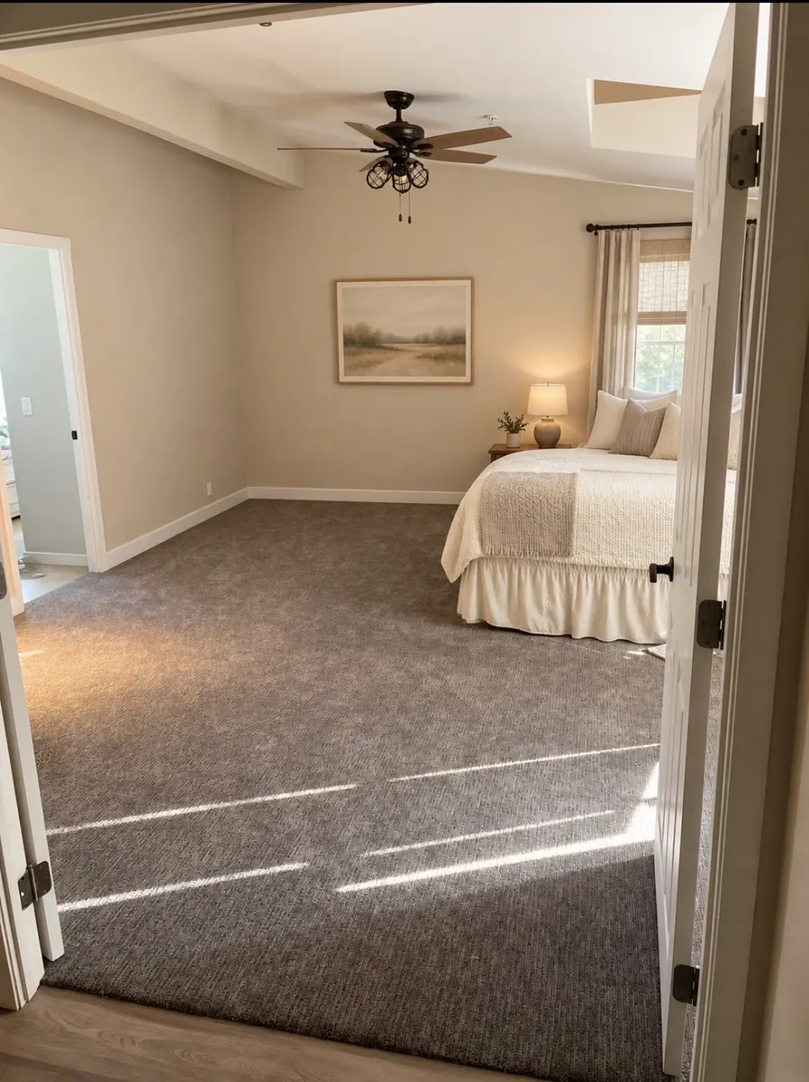 Finished gray patterned carpet installed by My-Key in a bright bedroom