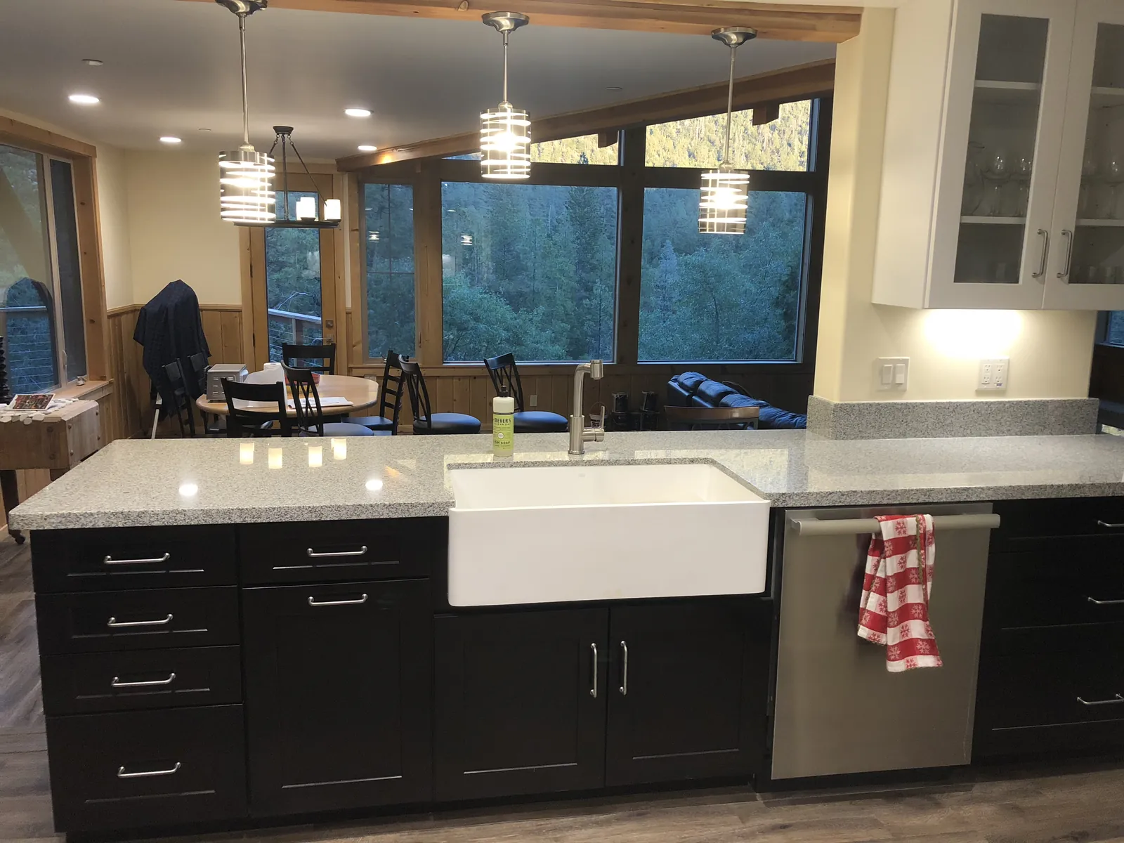 Completed kitchen countertop surrounding a white farmhouse sink